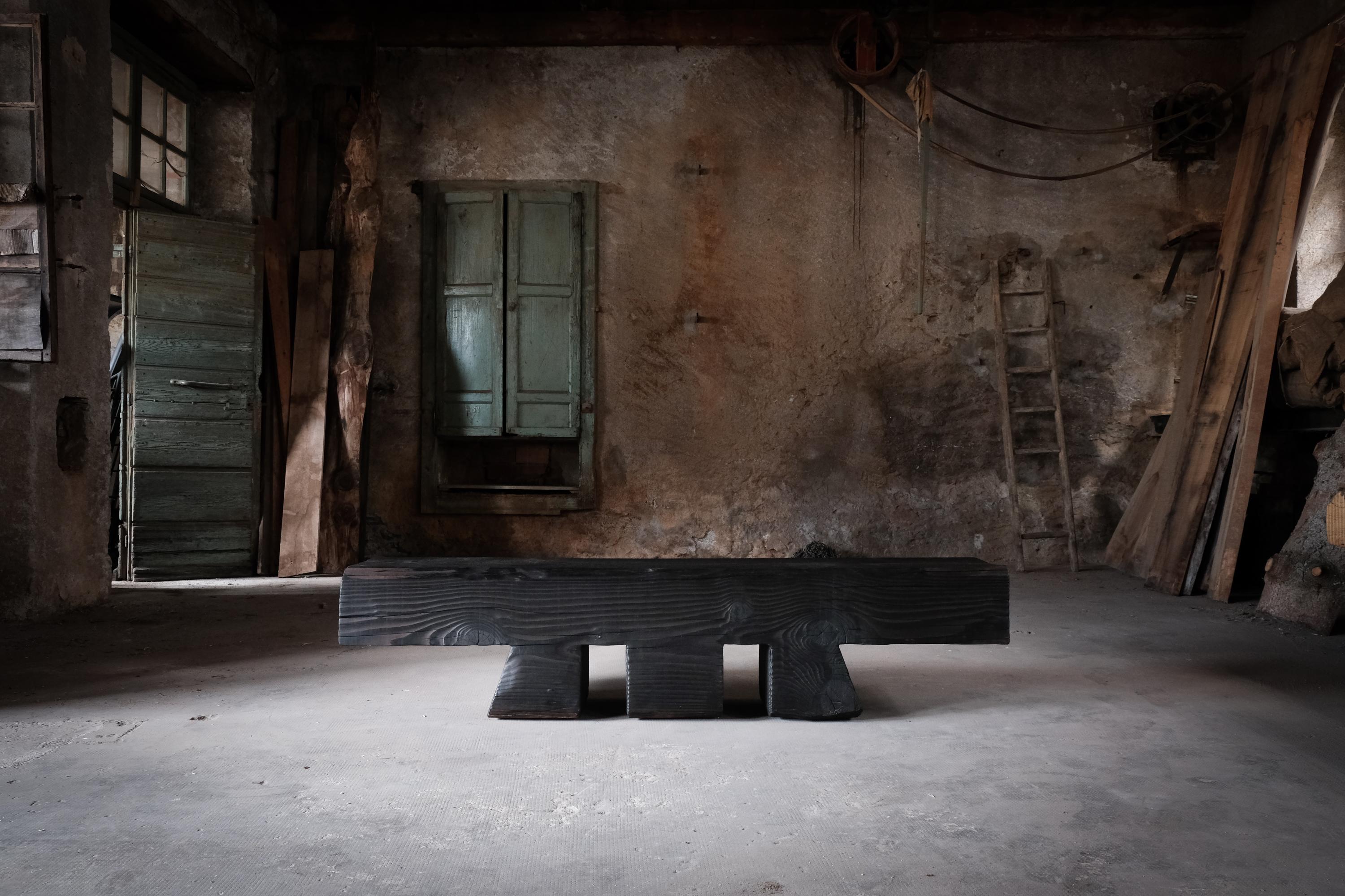 The 'Charred Panchetta Three-legged Bench' in cedar by Italian designer-maker Riccardo Monte is ideal as a hallway table, coffee table or bedroom bench. Inspired by the regional tradition of the Walser architecture of the Alps, it emblematises a