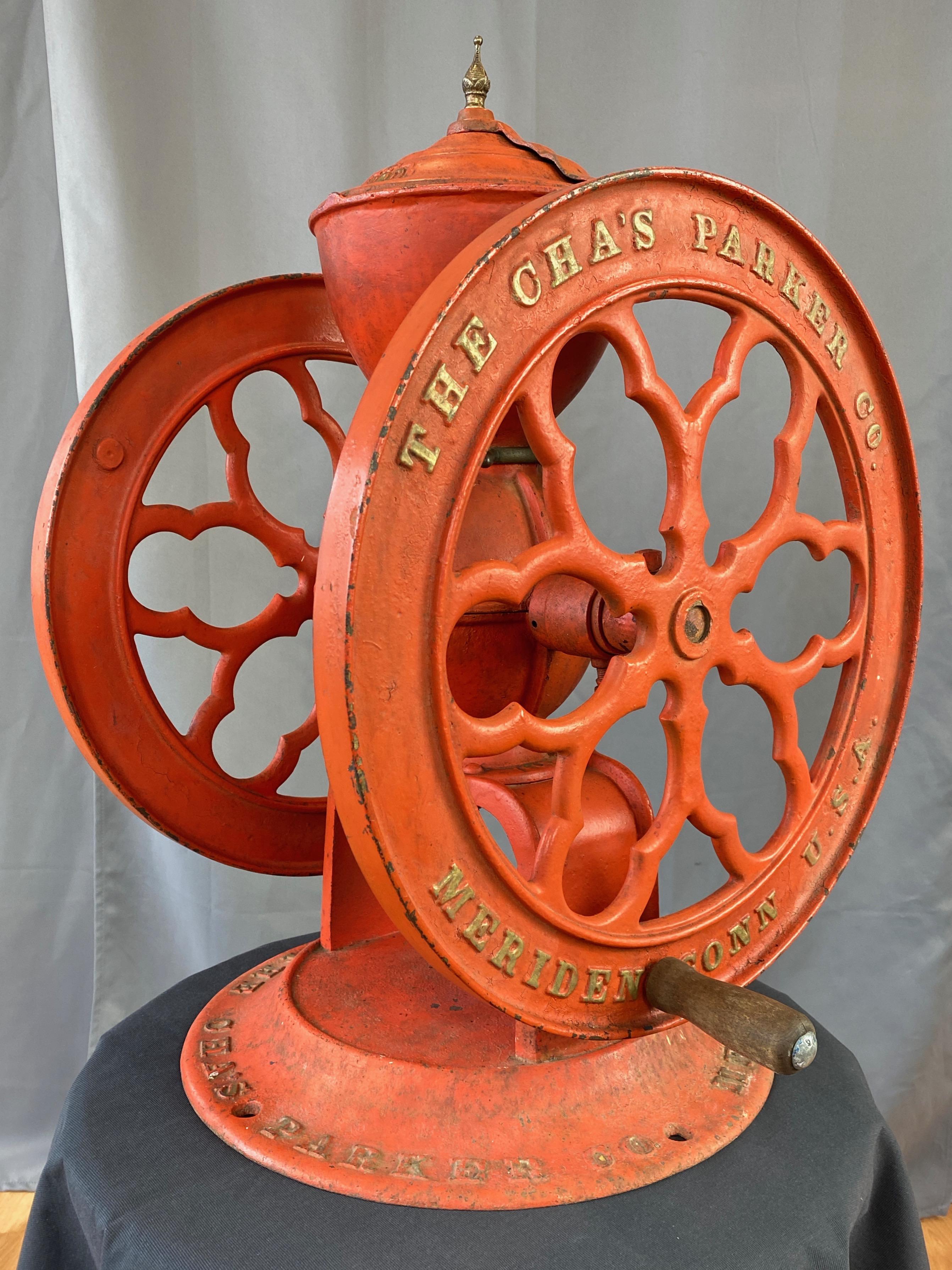 An impressive and less common single-color model No. 900 cast iron coffee mill or grinder by the Charles Parker Co. Patented in 1891, this example dates from later that decade.

Large and substantial 100 lb. cast iron design features dual 19.25 inch