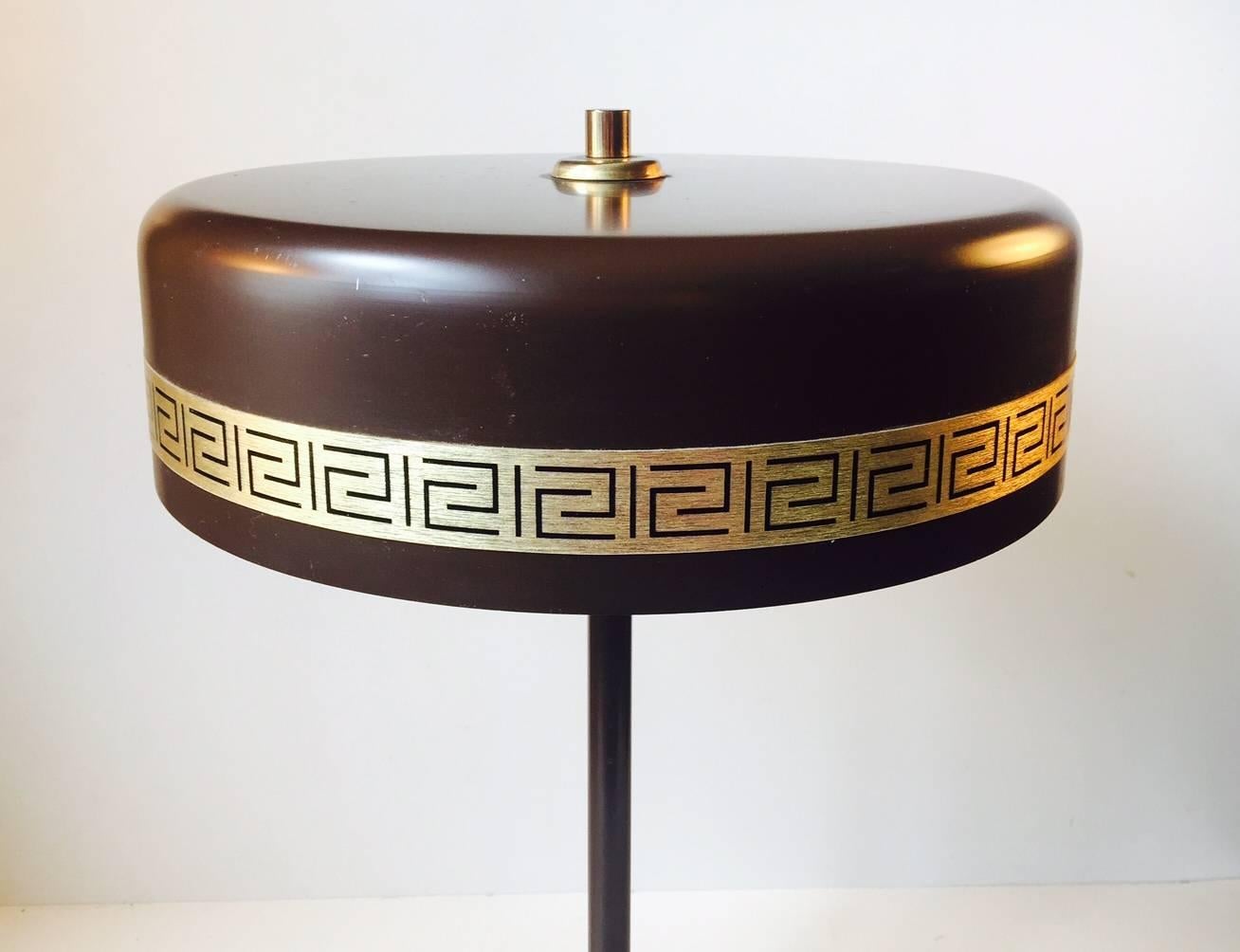 Rare desk lamp designed and manufactured by Vitrika in Denmark during the 1960s. It is model number 40304 and is called 'Chief'. Features brass detailing and hidden switch.