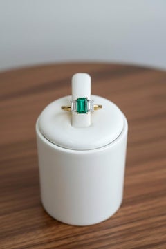 The Classic Trilogy 18K Gold 1.10 Carats Emerald and Diamond Engagement Ring