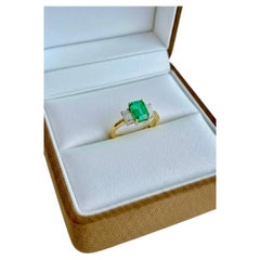 The Classic Trilogy 18K Gold 1.10 Carats Emerald and Diamond Engagement Ring
