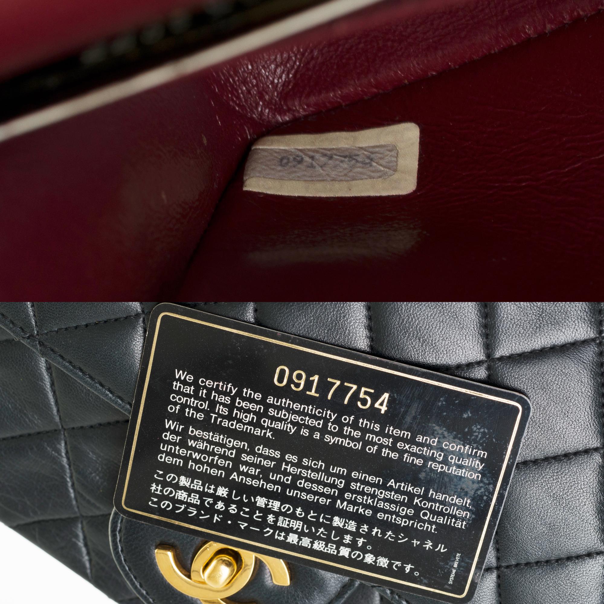 Die elegante Chanel Timeless 25cm Umhängetasche aus schwarzem gestepptem Lammleder und GHW 1