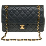 The Classy Chanel Timeless 25cm Shoulder bag in black quilted lambskin and  GHW at 1stDibs | chanel 25cm bag, 25cm chanel bag, 25 cm chanel bag
