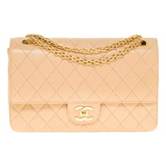 The Classy Chanel Timeless Medium Shoulder bag in beige quilted lambskin and GHW