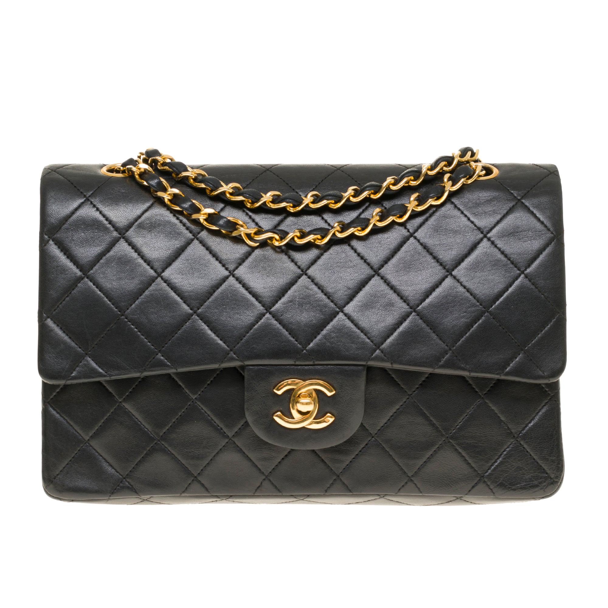The Classy Chanel Timeless Medium Shoulder bag in black quilted lambskin and GHW