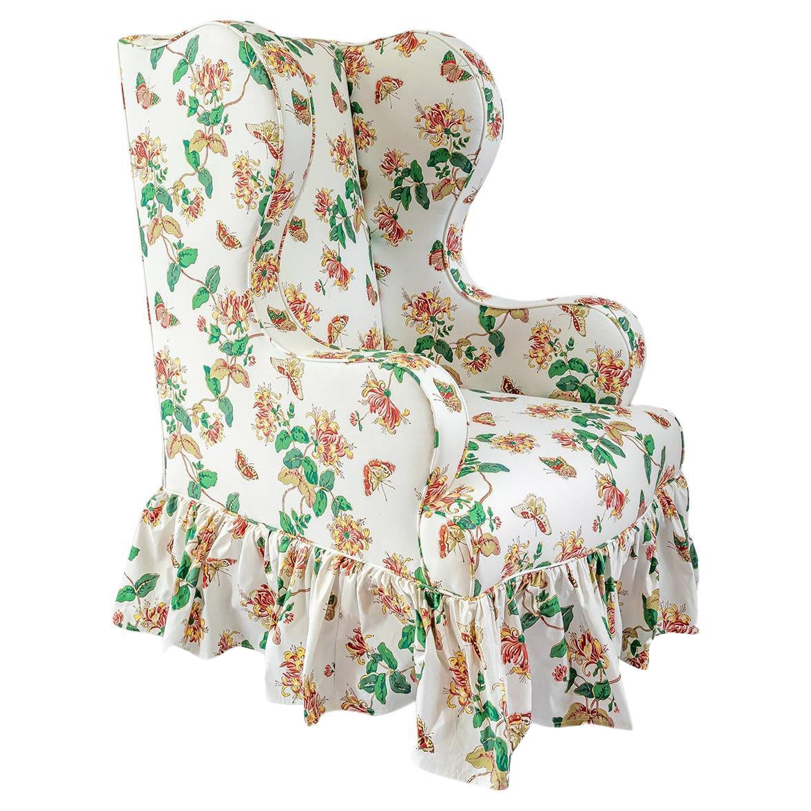 The Clementine Wing Chair, with Frilled Skirt upholstered in Honeysuckle For Sale