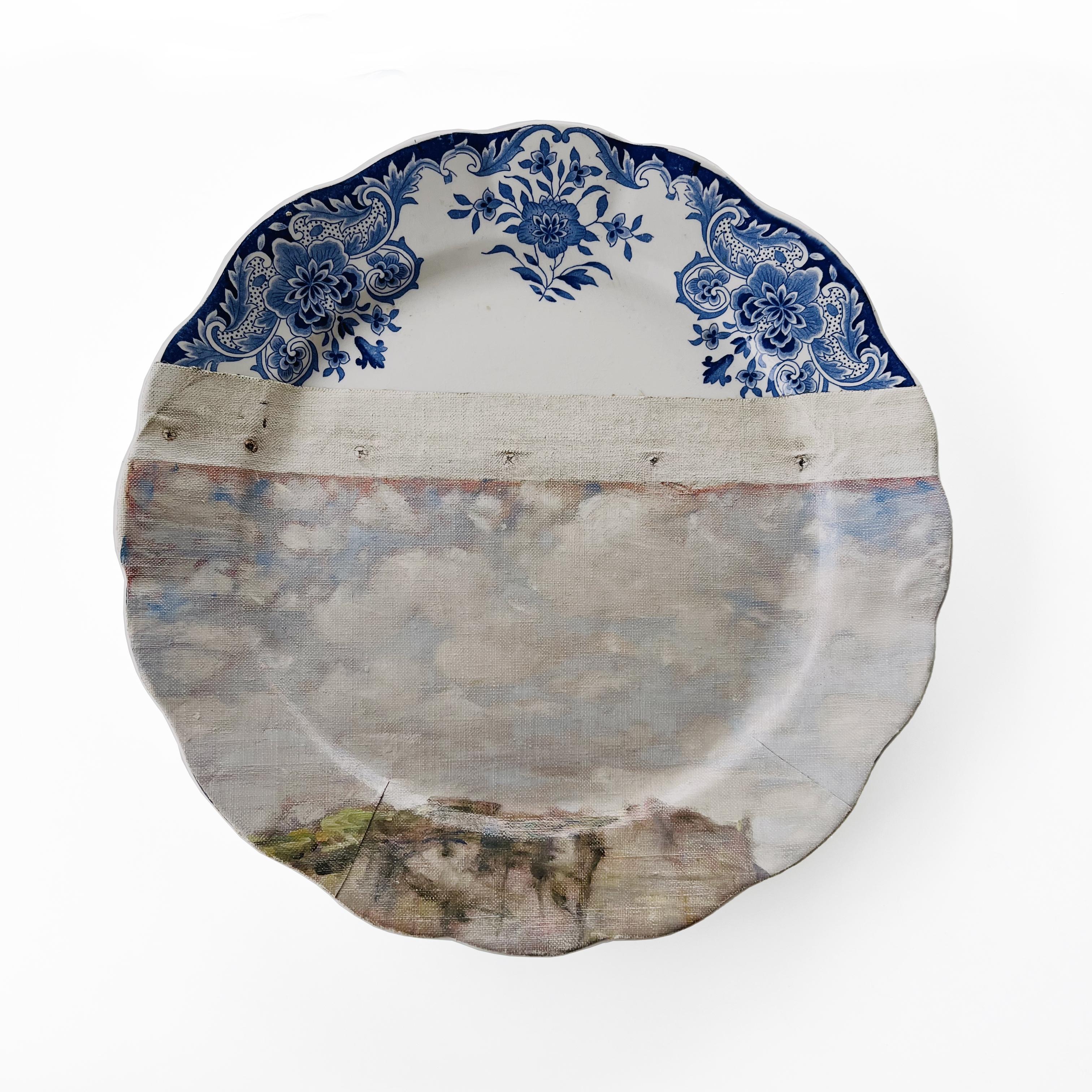 The Cliff of Étretat consists of 11 plates combined with two paintings of the famous Étretat cliffs off the coast of Normandy. They were often a subject of paintings by Claude Monet.

This one of a kind wall art composition of decorative plates and