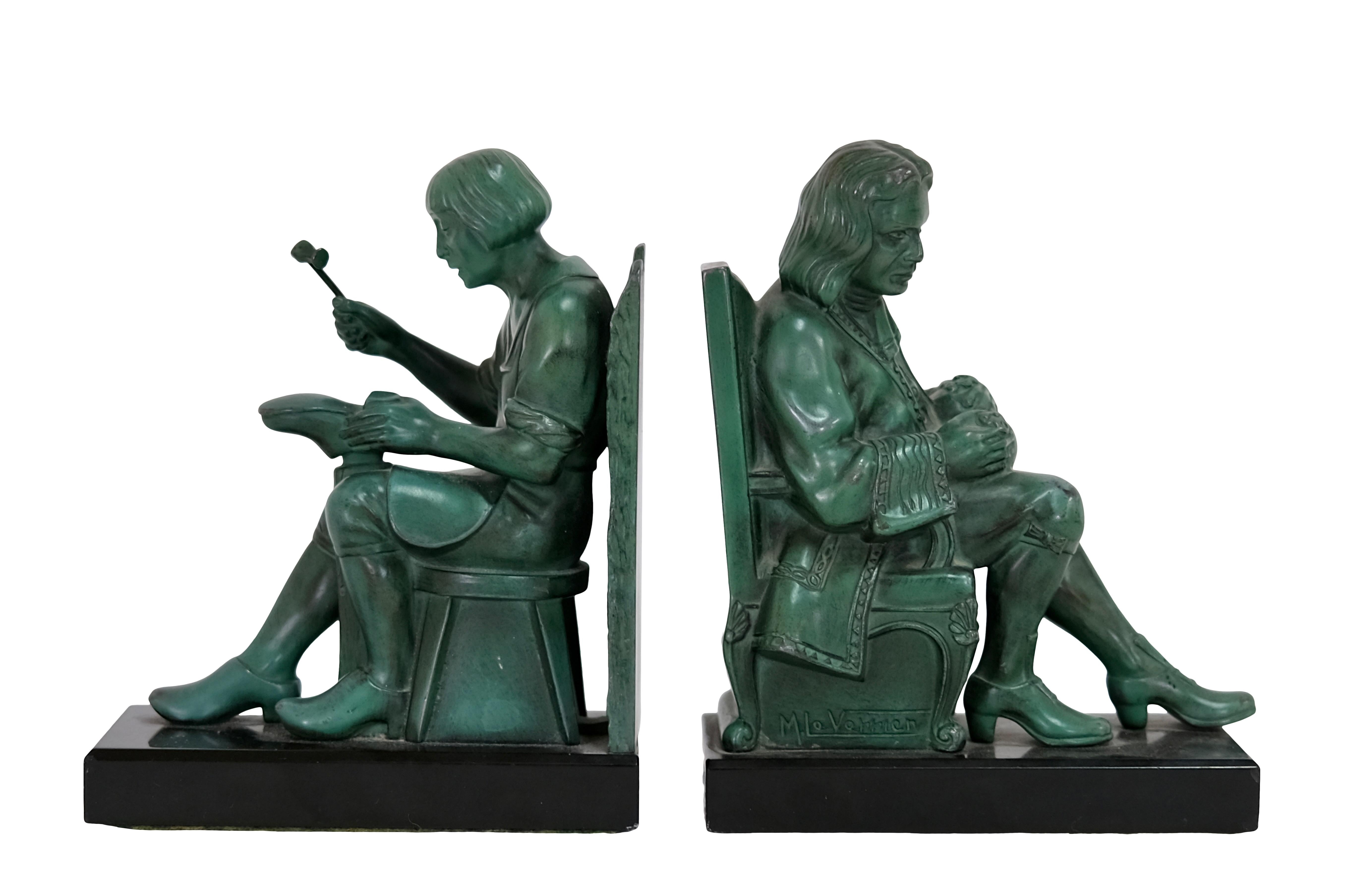 The Cobbler working on Boots and the Nobleman protecting his Money. 
Bookends by “Max Le Verrier”, signed
Original French Art Deco, 1930s

Bookends made in “Régule” (spelter) 
Socle in Marble 
Original green patina 

Dimensions each