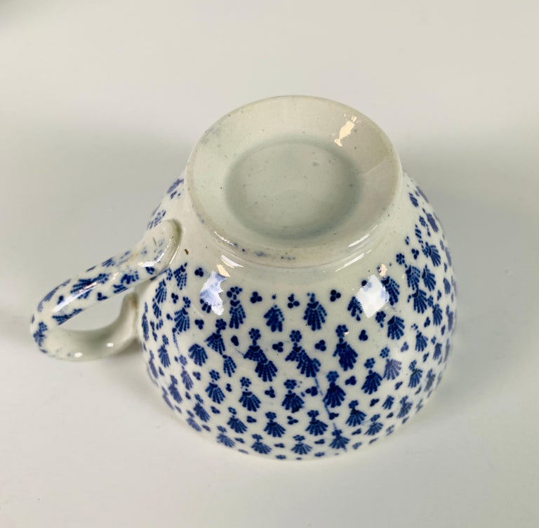 Earthenware Collection of Mario Buatta a Small Blue and White Tea Cup and Saucer For Sale