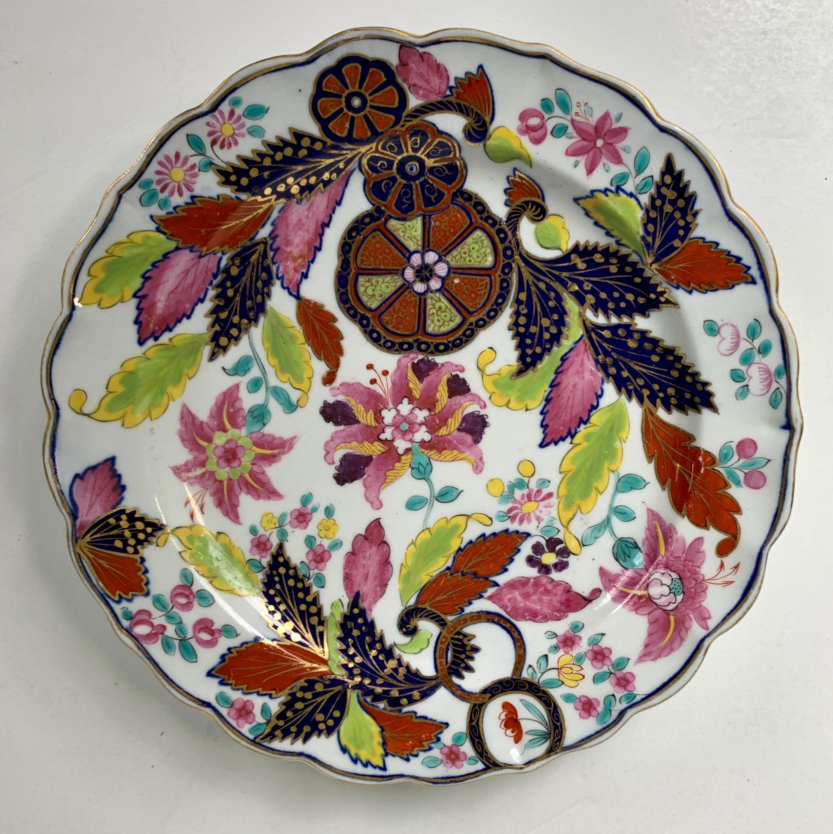 Provenance: The Private Collection of Mario Buatta 
This pair of small Chinese export porcelain dishes are hand-painted in the Tobacco Leaf pattern.
The dishes are gorgeous! Mario loved porcelain with well-painted flowers and unexpected color