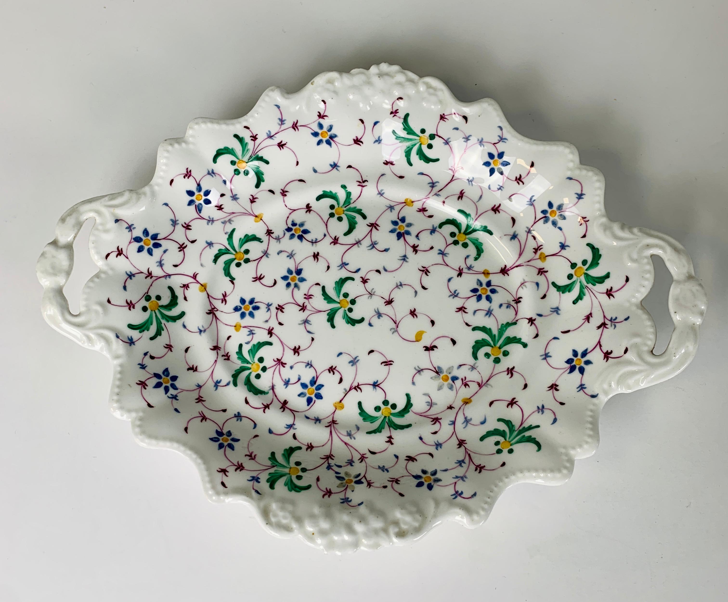 Provenance: The Private Collection of Mario Buatta a group of three shaped dishes decorated with similar red and green
floral patterns. Made of earthenware in England circa 1830 this group of three dishes have a lovely informal feel.
Mario