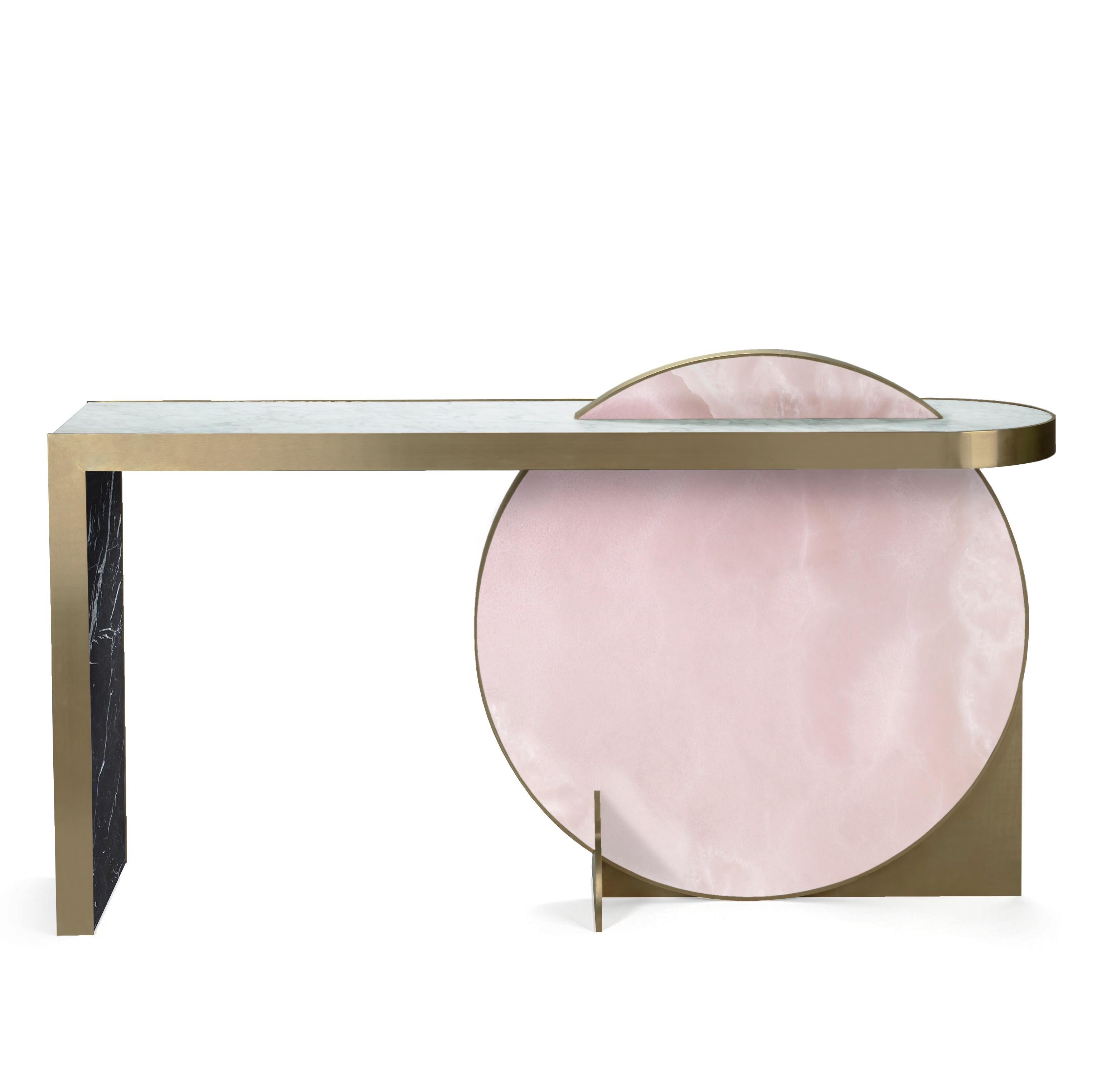 Inspired by the planets and their orbital movements, a recurrent theme in Lara Bohinc’s work, the Lunar Collection features important pieces of furniture, with highly-figured marbles set like jewels within golden rims. Disc shapes bisect or overlay