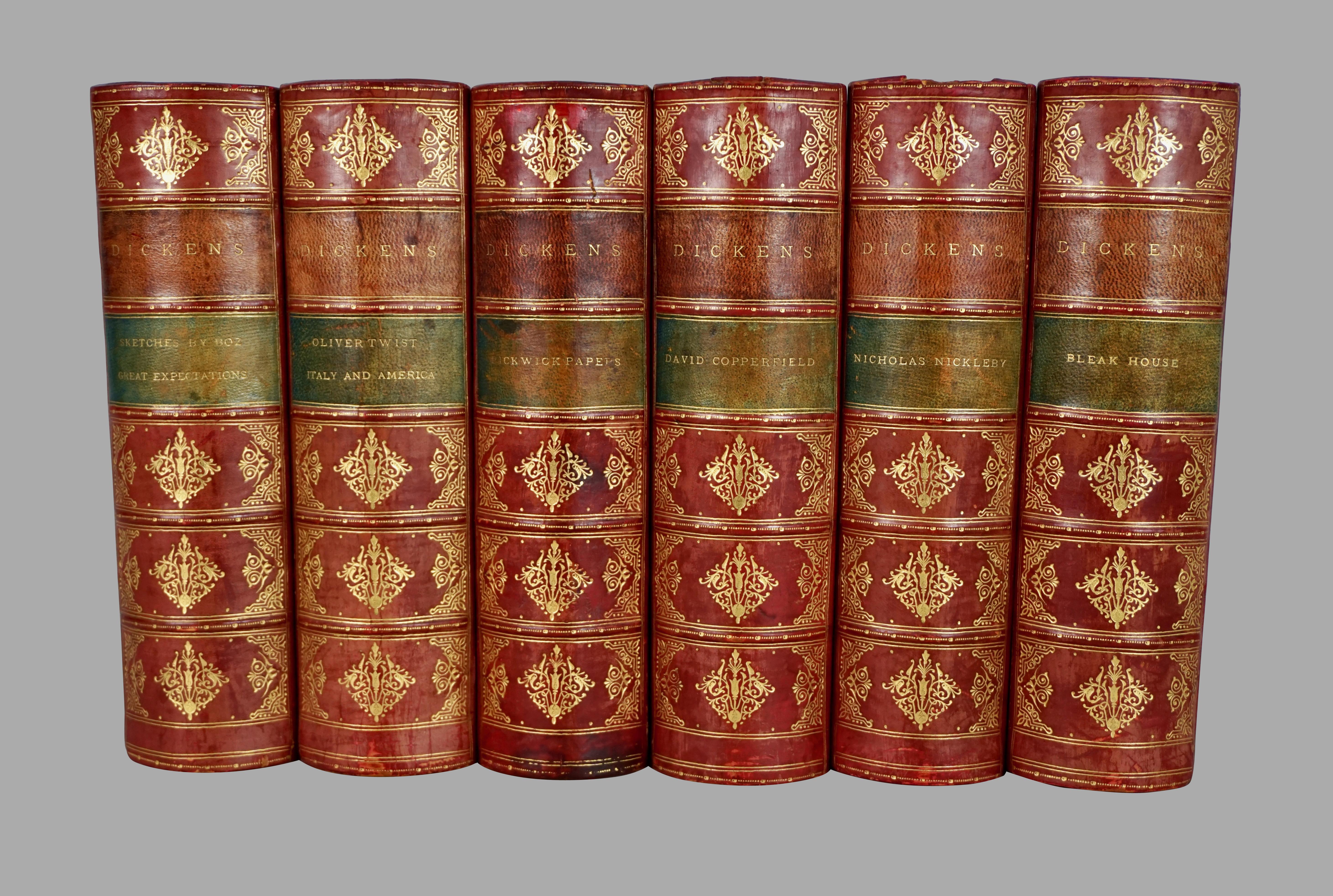 The complete illustrated works of Charles Dickens in 15 leatherbound and marbleized paper bindings, published in New York by George Routledge and Sons. This set includes all the classics like Bleak House, Nicholas Nickleby and David Copperfield with