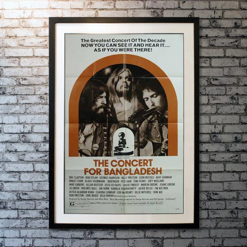 The Concert for Bangladesh, unframed poster, 1972

Original one sheet (27 X 41 inch). The first benefit rock concert when major musicians performed to raise humanitarian relief funds for the refugees of Bangladesh of 1971 war.

Featuring Eric