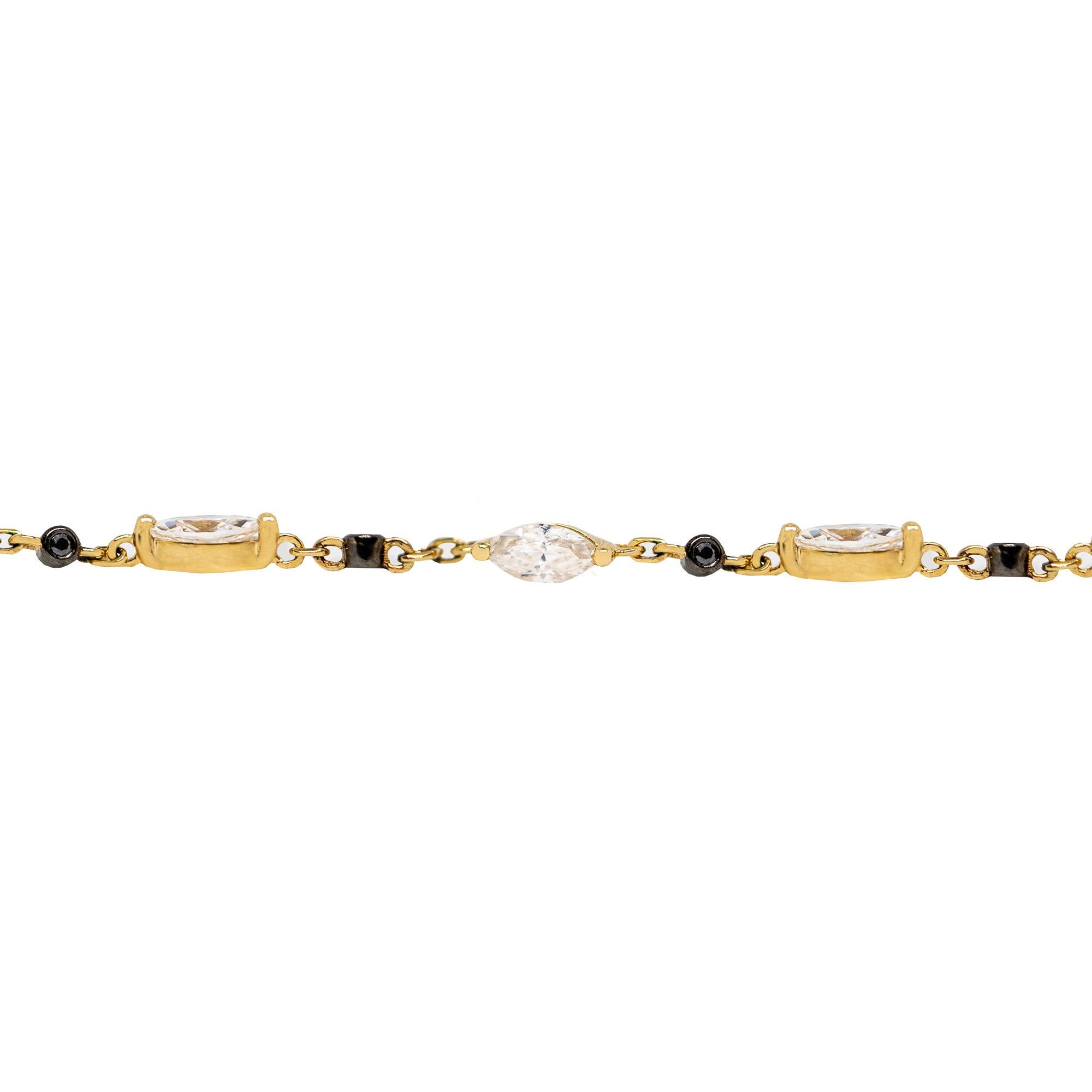 This Choker is made with twinkling white marquise moissanites and black round sapphires, set in black enamel. Like a constellation in the night sky, the marquise stones are shooting comets amongst the black sapphire night.

“She was his comet, his