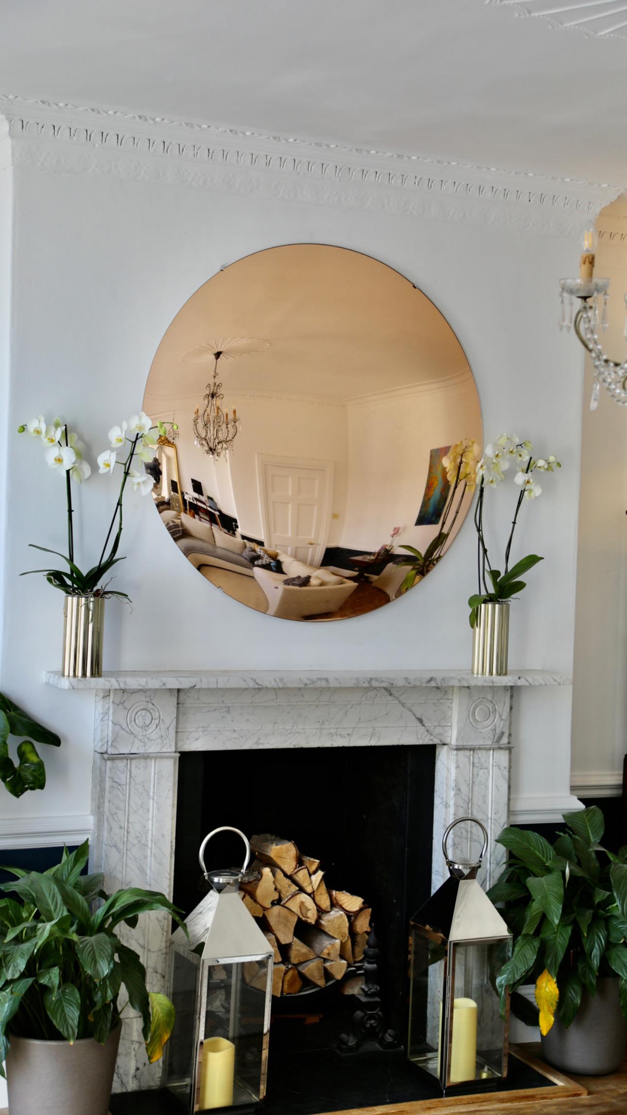 The Ravello 150 cm rose gold glass convex wall mirror is fabricated from 6mm low iron glass for extra clarity. 

The mirror is 150 cms in diameter and held in position with four matching wall fixings. The projection of the mirror is 8 cms.

We also
