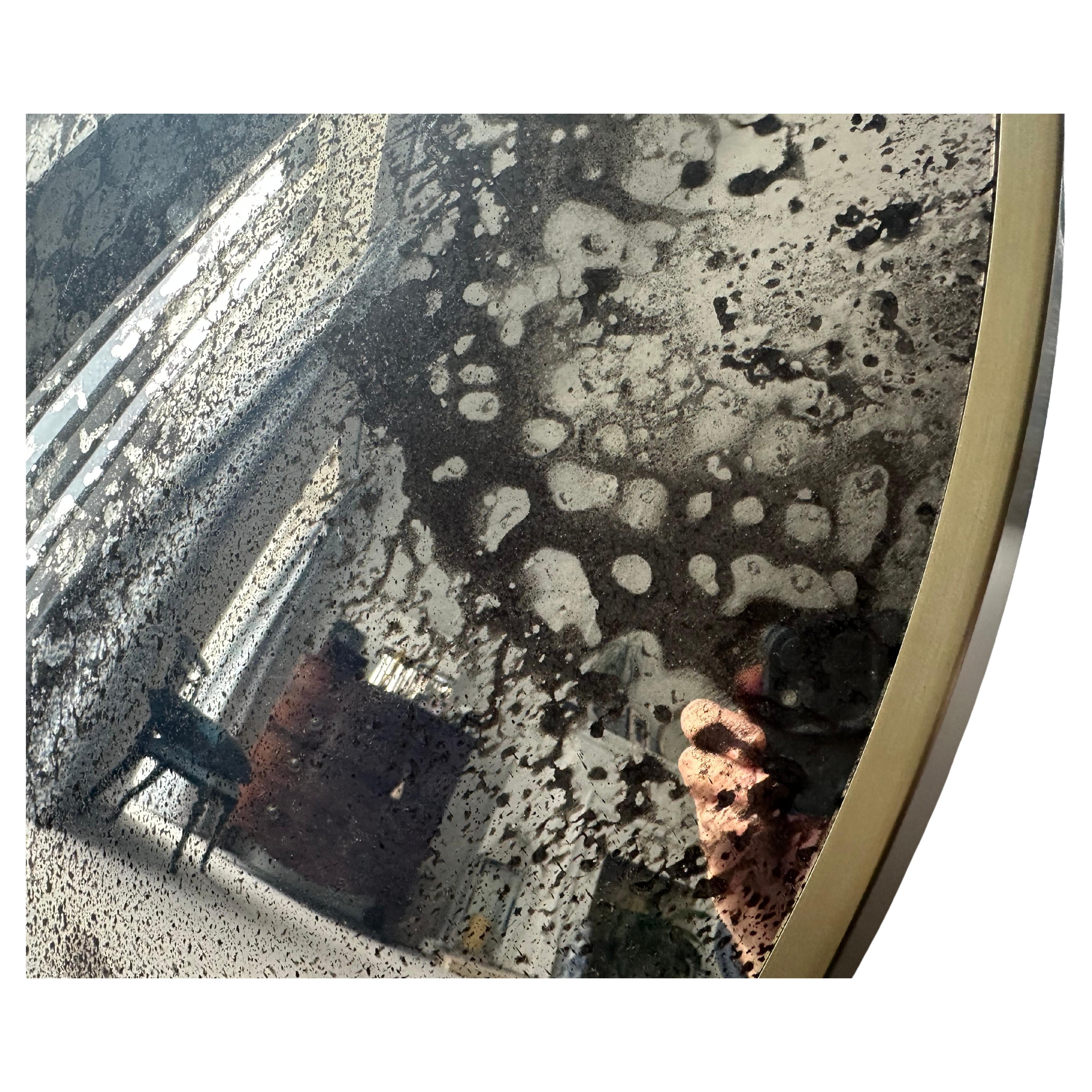 The vernazza 80 cm heavily antiqued glass convex wall mirror is fabricated from 6mm low iron glass for extra clarity. Heavily antiqued with greys and golds.

The mirror is 80 cms in diameter and held in position with four matching wall fixings. The