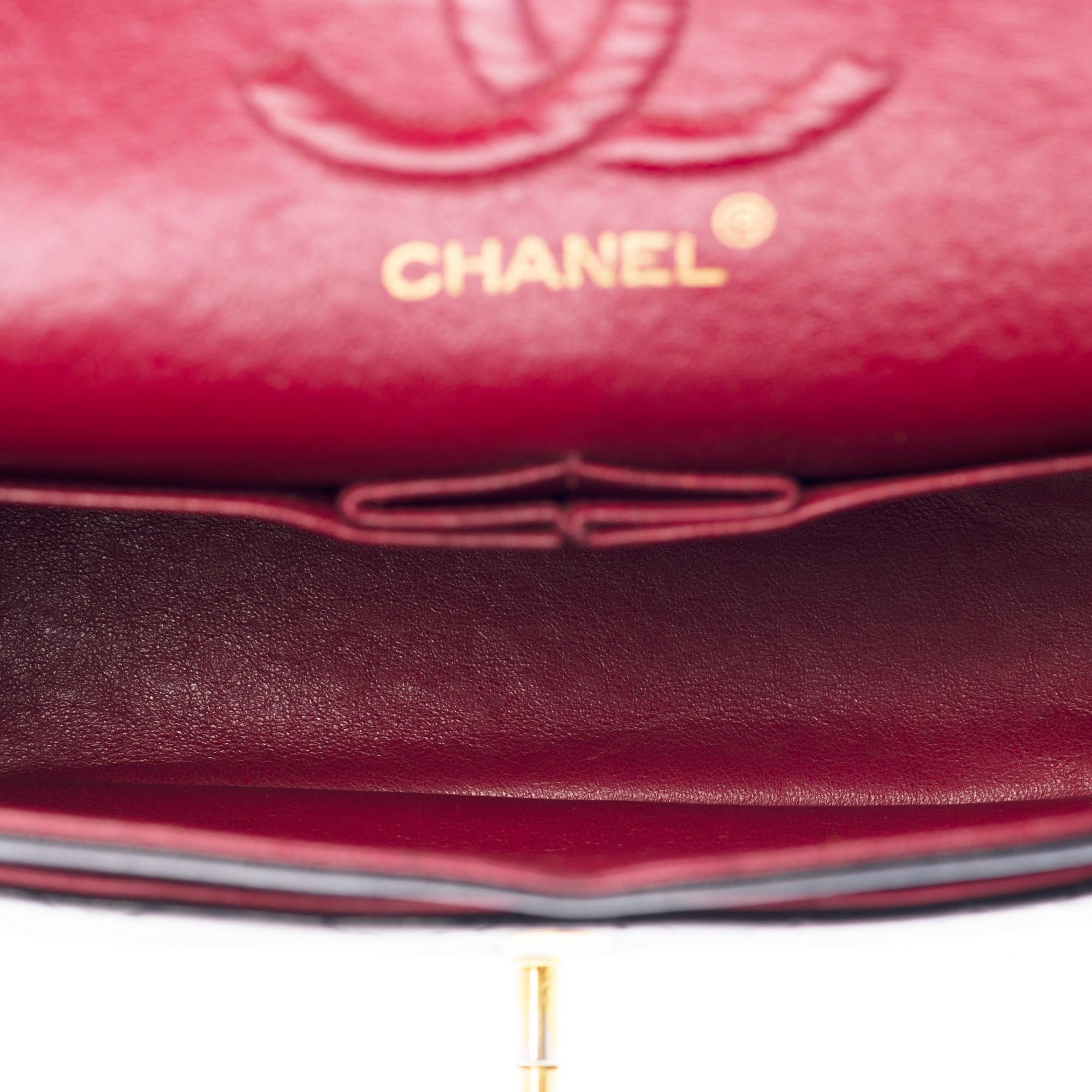 The Coveted Chanel Timeless 23cm Shoulder bag in black quilted lambskin and GHW 1