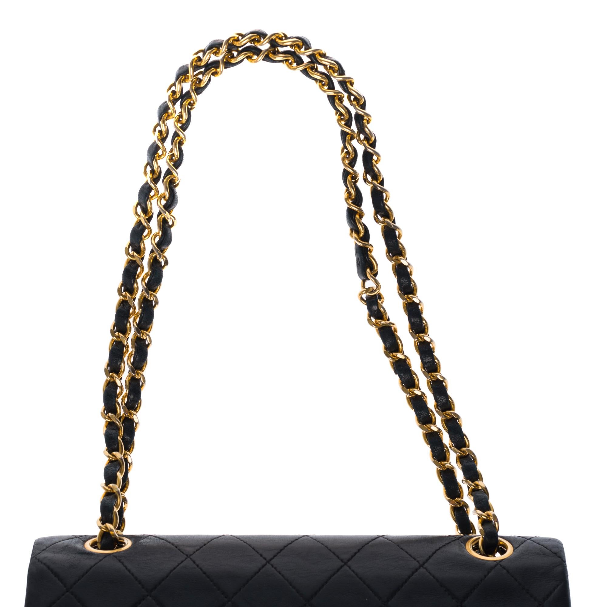 The Coveted Chanel Timeless 23cm Shoulder bag in black quilted lambskin and GHW 2