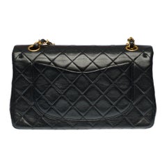 The Coveted Chanel Timeless 23cm Shoulder bag in black quilted lambskin, GHW