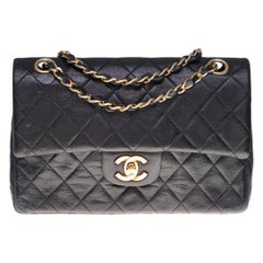 The Coveted Chanel Timeless 23cm Shoulder bag in black quilted lambskin, GHW