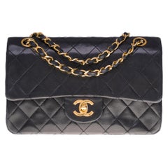 The Coveted Chanel Timeless 23cm Shoulder bag in black quilted lambskin, GHW