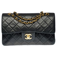 The Coveted Chanel Timeless 23cm Shoulder bag in black quilted lambskin, GHW