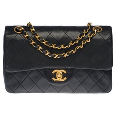 The Coveted Chanel Timeless 23cm Shoulder bag in black quilted lambskin, GHW