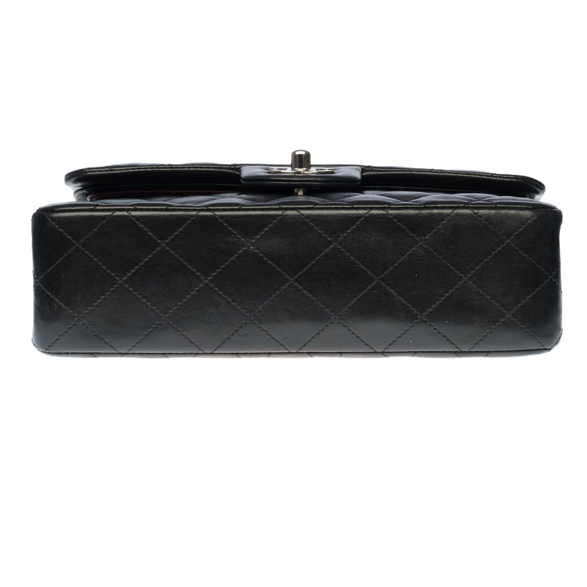 The Coveted Chanel Timeless 23cm Shoulder bag in black quilted lambskin, SHW 1