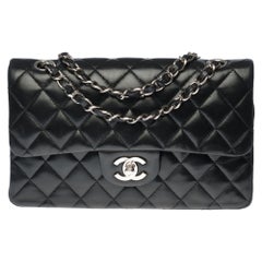 The Coveted Chanel Timeless 23cm Shoulder bag in black quilted lambskin, SHW