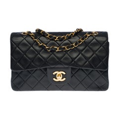 The Coveted Chanel Timeless 23cm Shoulder bag in black quilted lambskin, SHW