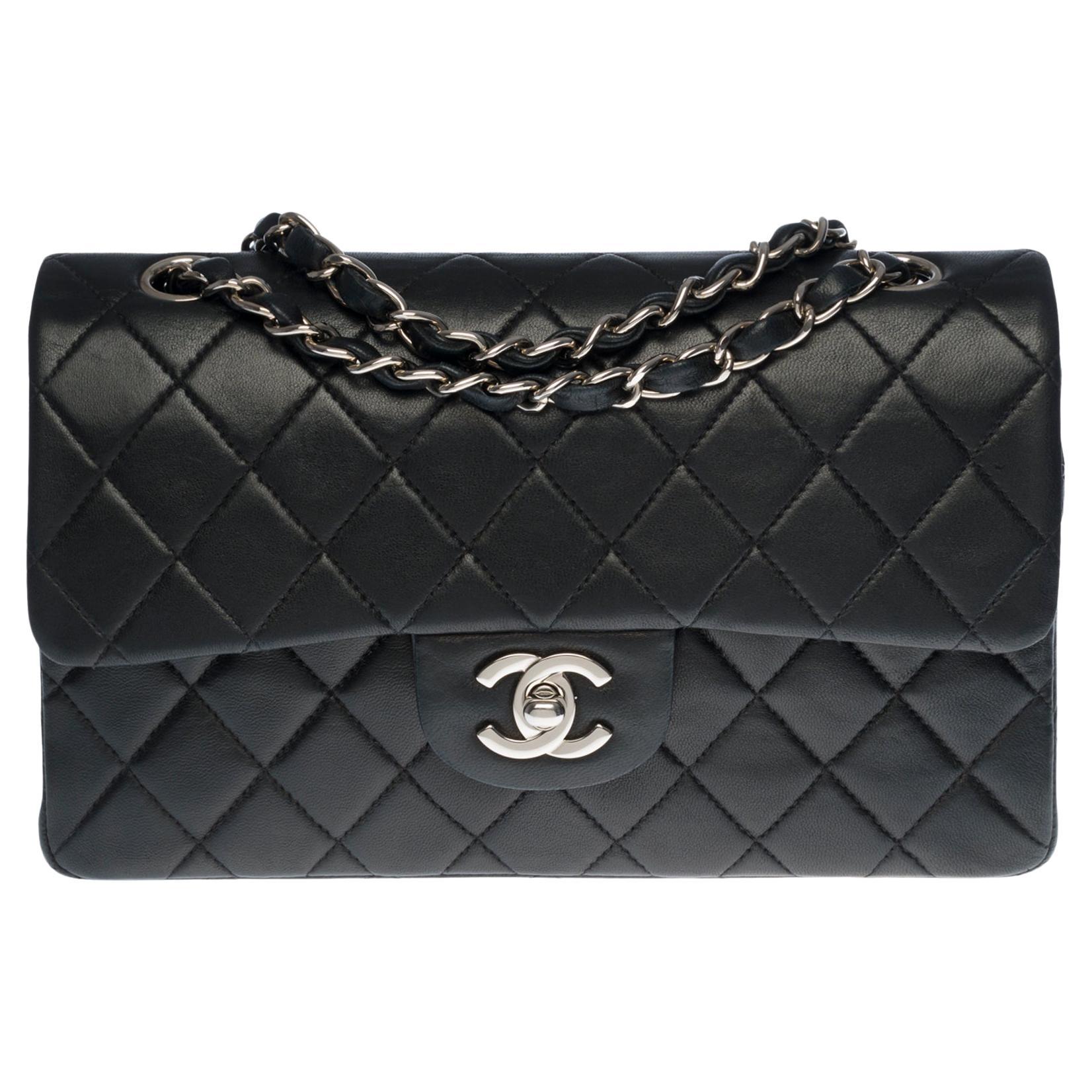 The Coveted Chanel Timeless 23cm Shoulder bag in black quilted lambskin, SHW