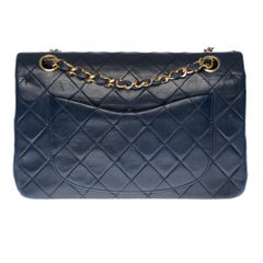 The Coveted Chanel Timeless 23cm Shoulder bag in navy blue quilted lambskin, GHW