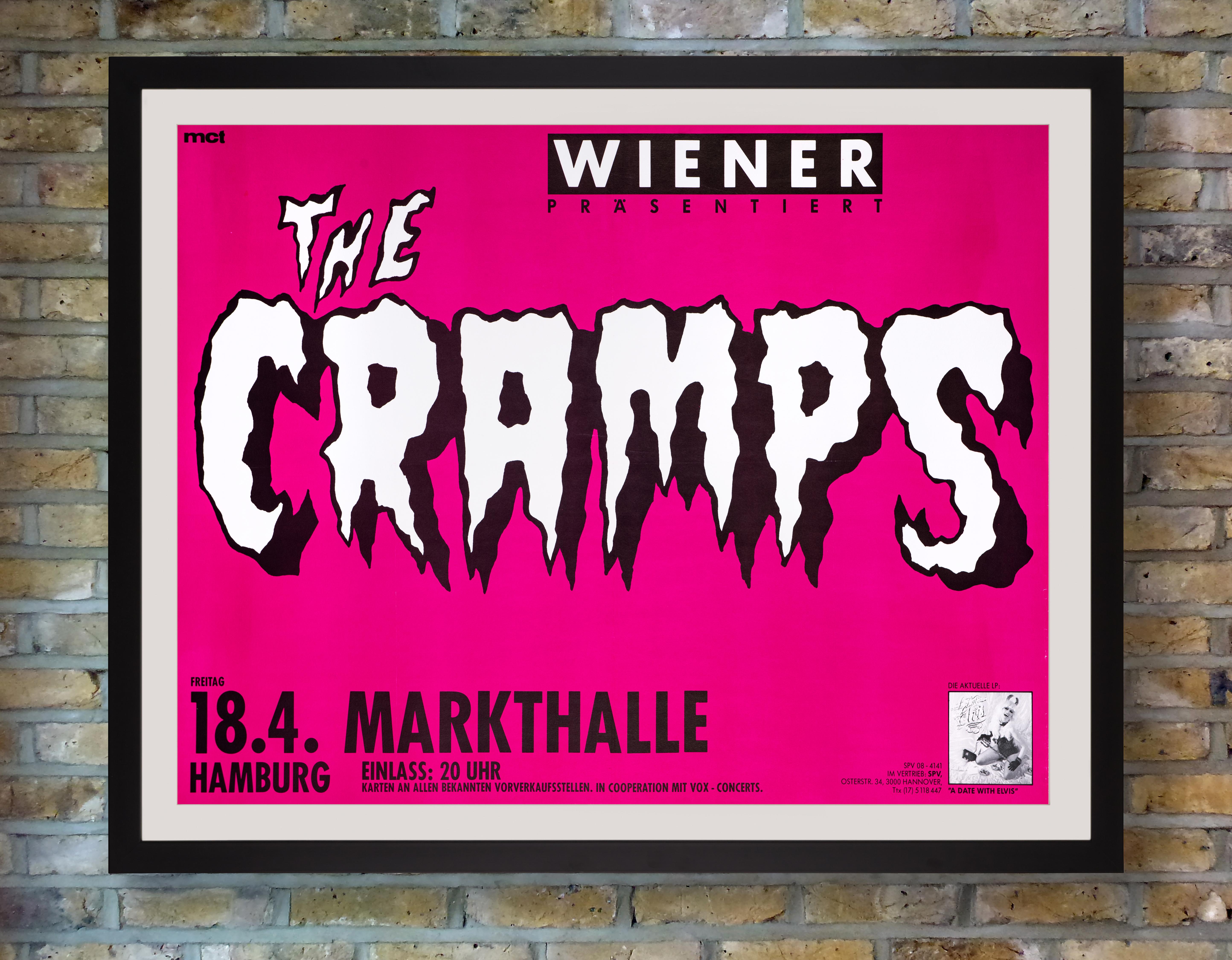 A vibrant pink poster for a performance by American garage punk band The Cramps at Markthalle, Hamburg, Germany, on 18 April 1986 in support of their third studio album 'A Date with Elvis.' Two separate bootleg recordings of this concert have been