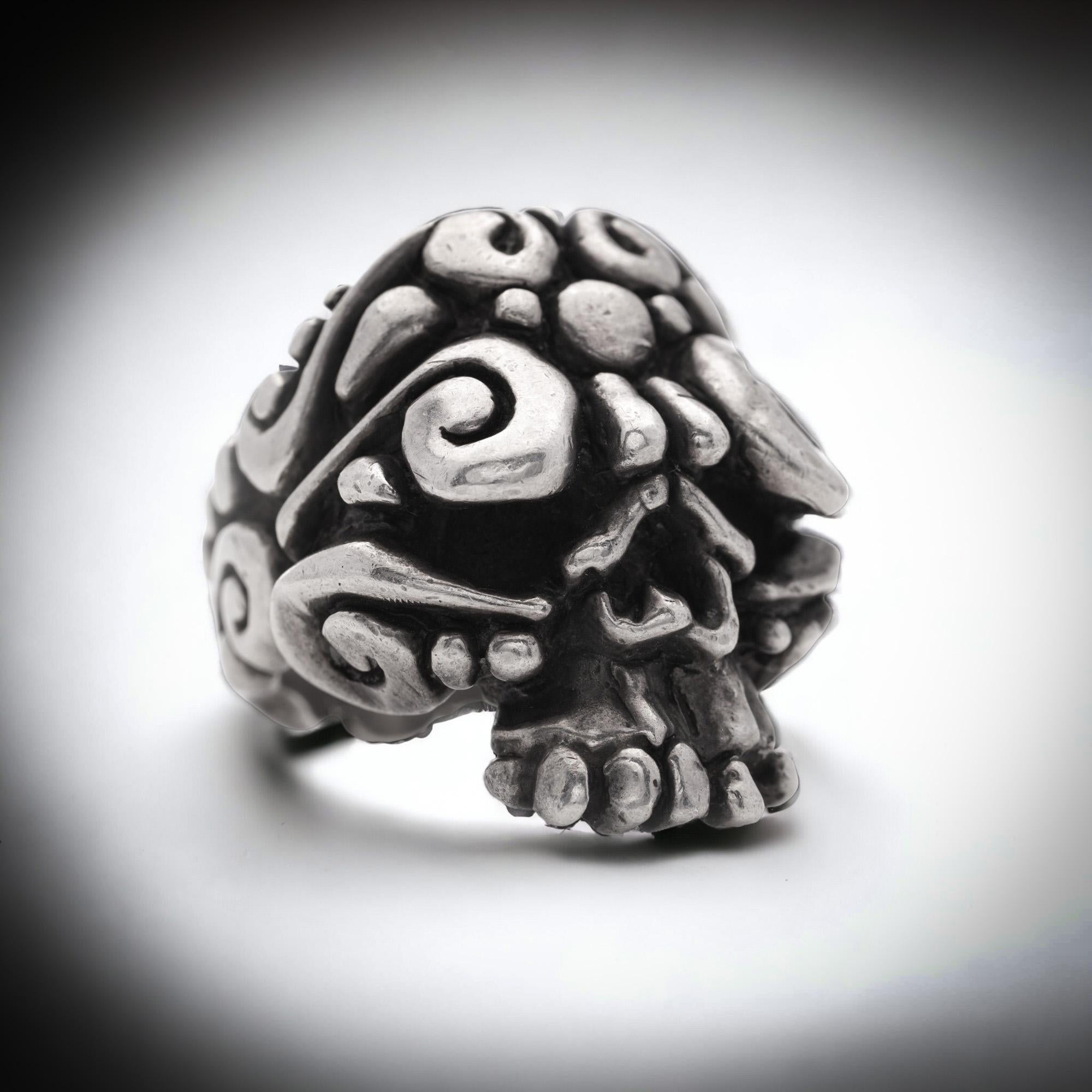 The Crazy Pig Designs 925 sterling silver ' El Muerto ' collection skull ring. 
Made in the United Kingdom, London.
Maker: The Crazy Pig Designs 
Hallmarked with the maker's mark and 925 silver. 
The inside of the shank has a personal engraving.