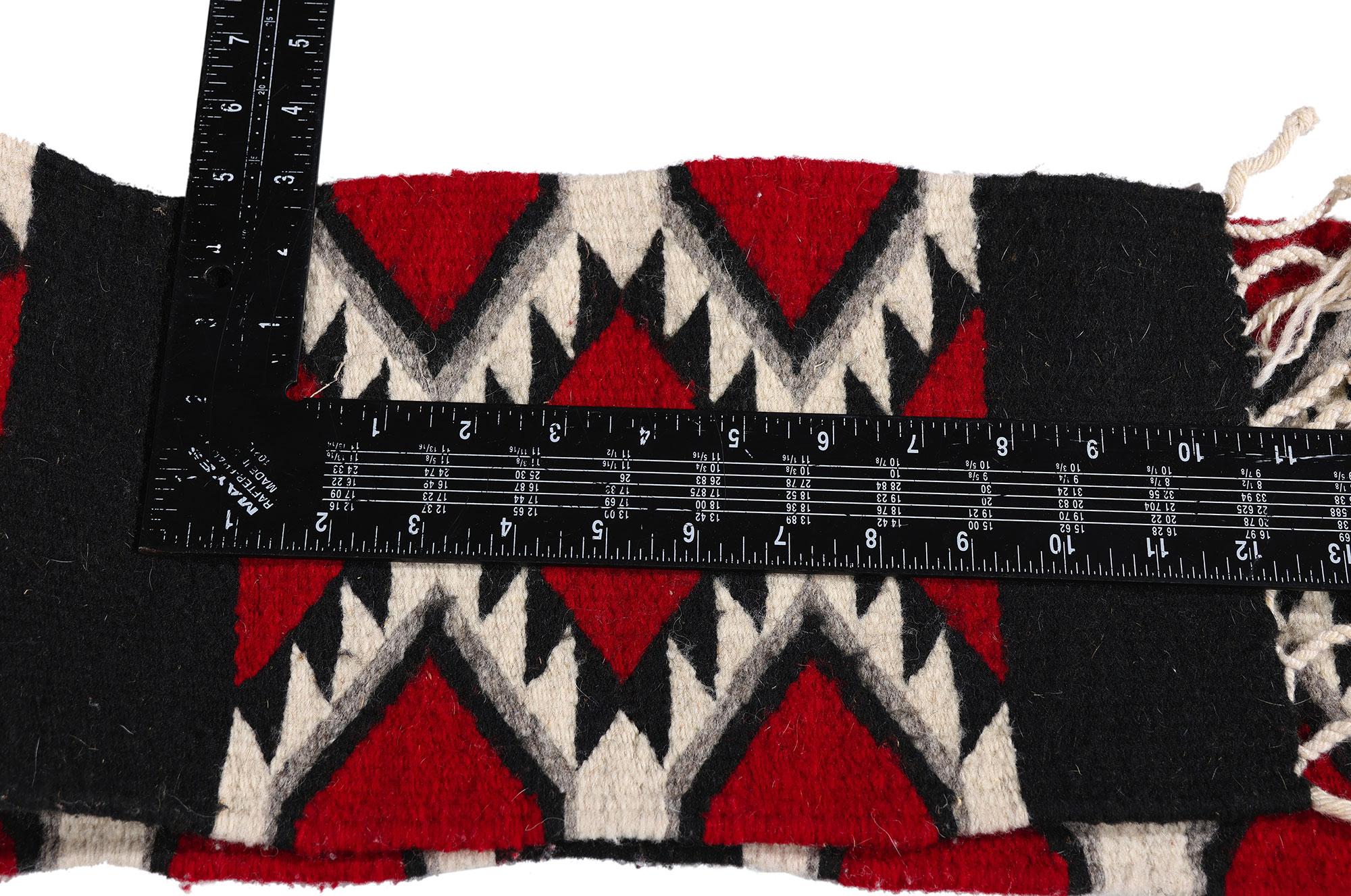 79336 Vintage Oaxacan Zapotec Kilim Table Runner, 00'08 x 04'08. Imbued with ancestral spirit and woven in the highland looms of Oaxaca, this handwoven wool Zapotec kilim table runner is a rarefied expression of indigenous heritage and contemporary