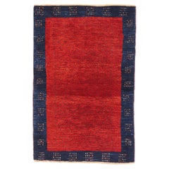 The Crimson Solitude: Vintage Persian Gabbeh Masterpiece of Minimalist Grandeur