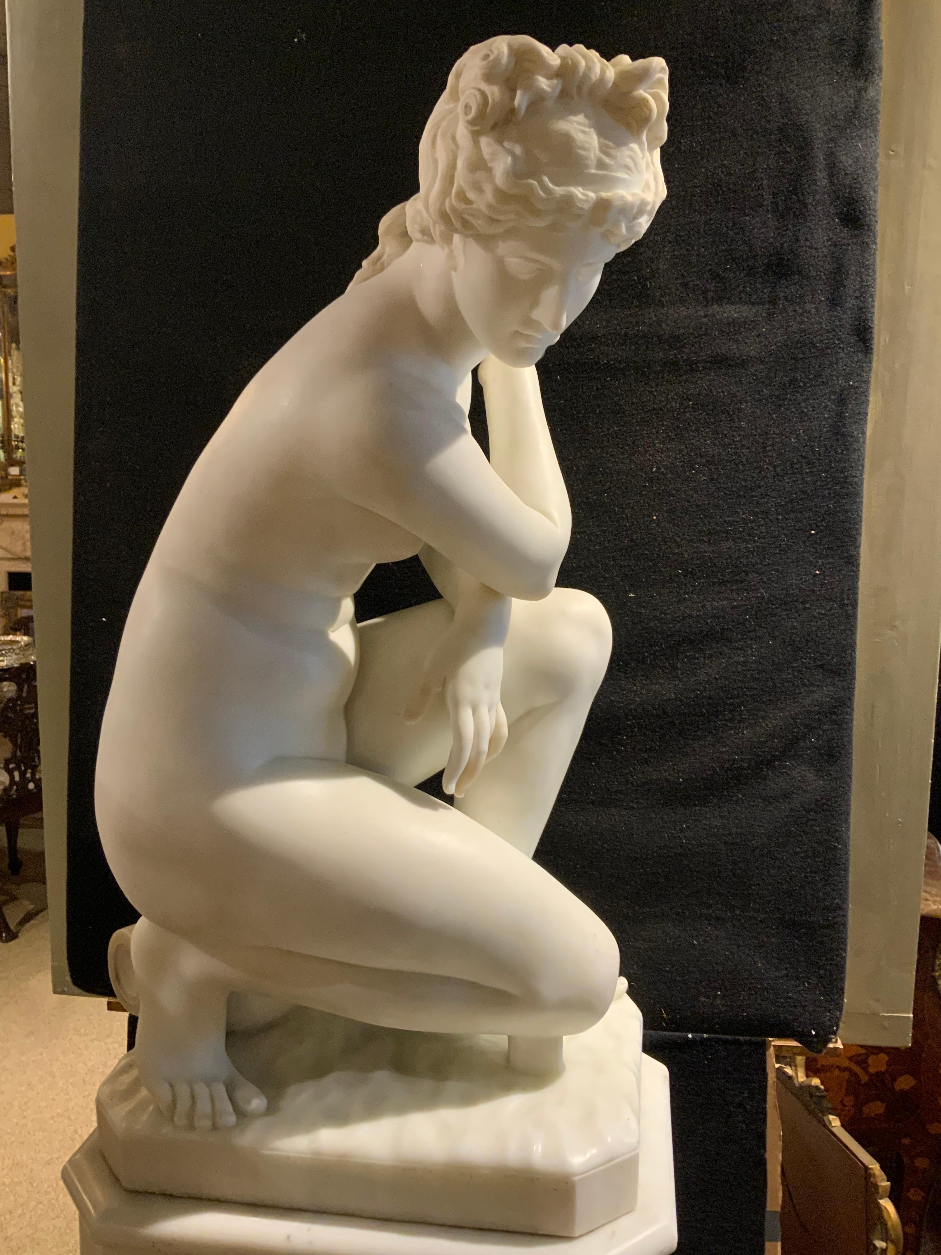 Neoclassical carved white marble sculpture, crouching Venus, signed verso P. Bazzanti
(Pietro Bazzanti, Italian, 1825-1895), Florence, rising on Carrara marble pedestal, custom 
Carved for the piece. Provenance from a prominent Dallas, Texas