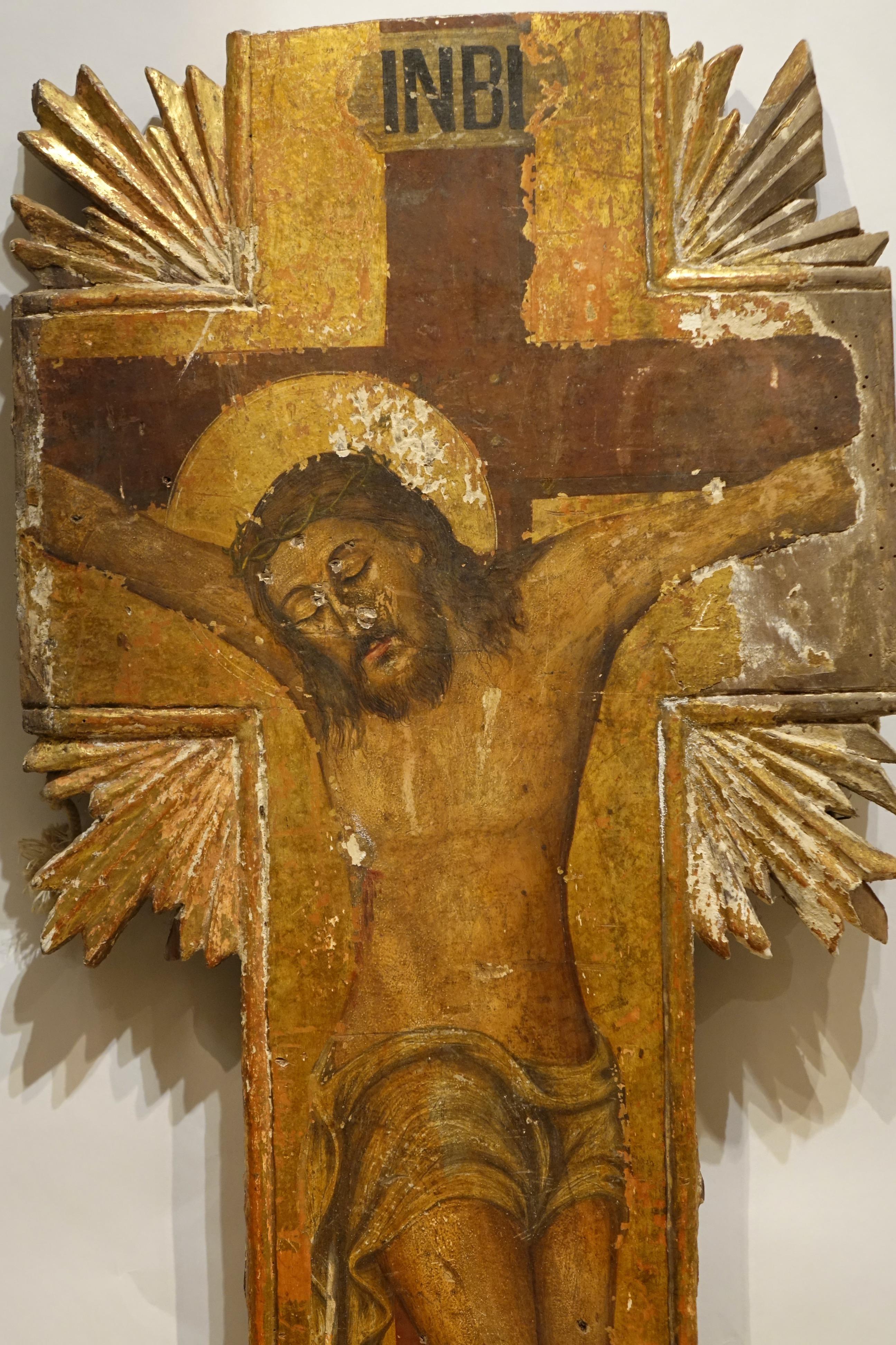 Das Kruzifix ist im Stil der Renaissance gemalt.
Tempera auf Holz
Inschrift: INBI
In der Ostkirche, in der Griechisch die wichtigste liturgische Sprache ist, würde man 