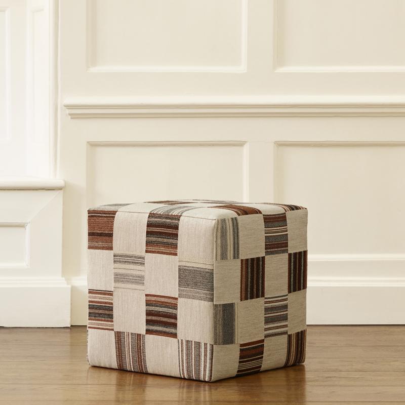 The Cube Stool, is the perfect foot perch or pair it with a brass tray and cocktail glasses for a chic and stylish aperitif hour.

Kilims are a staple at Sister for their hard-wearing, earthy charm. The Patch fabric range builds out on firm