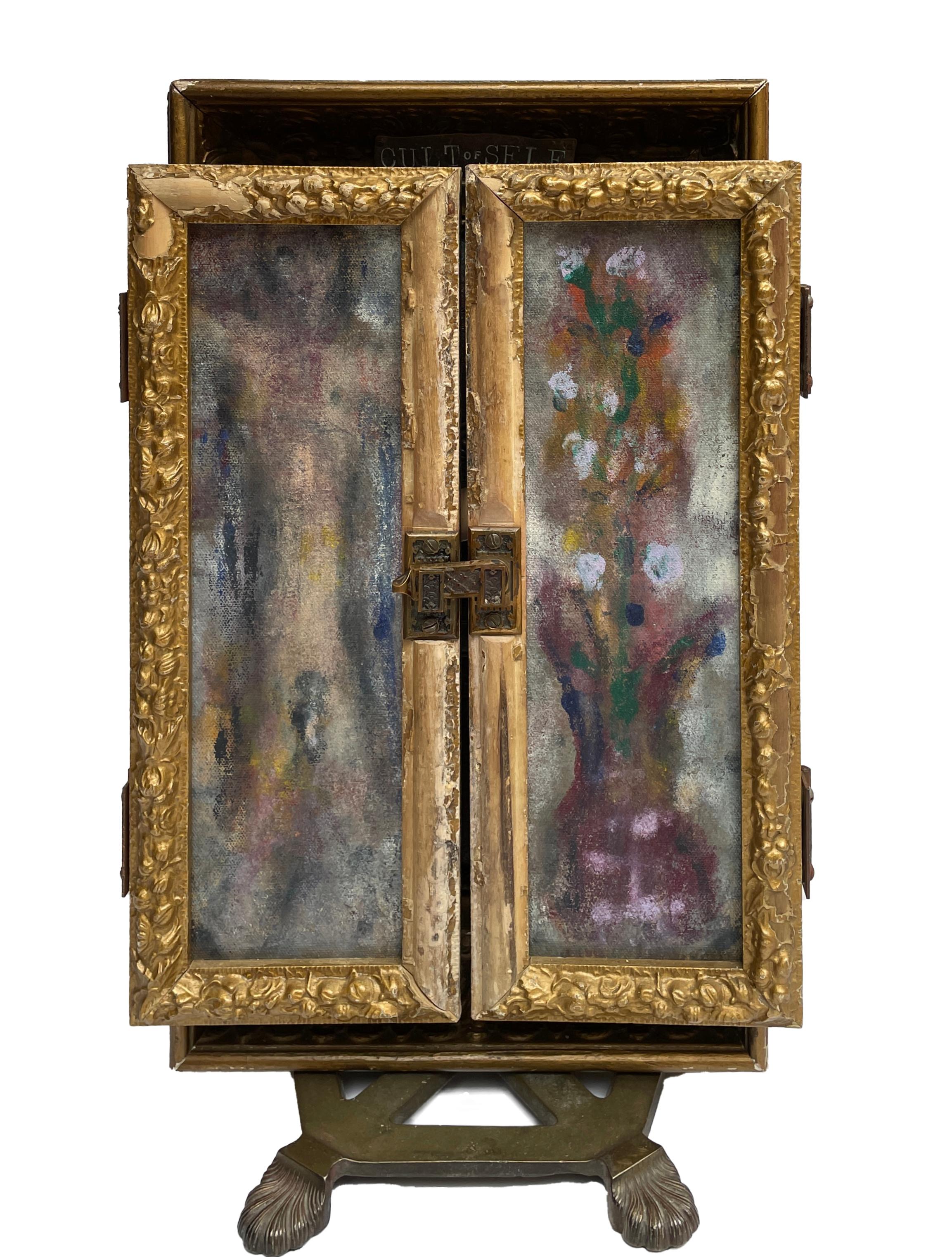 Self-taught artist John Seubert, AKA John Dolly, uses objects he uncovers as he rehabs older homes in Chicago. This piece has two handmade frames mounted side by side. Each side is a different treasure to discover. The front frames are two abstract