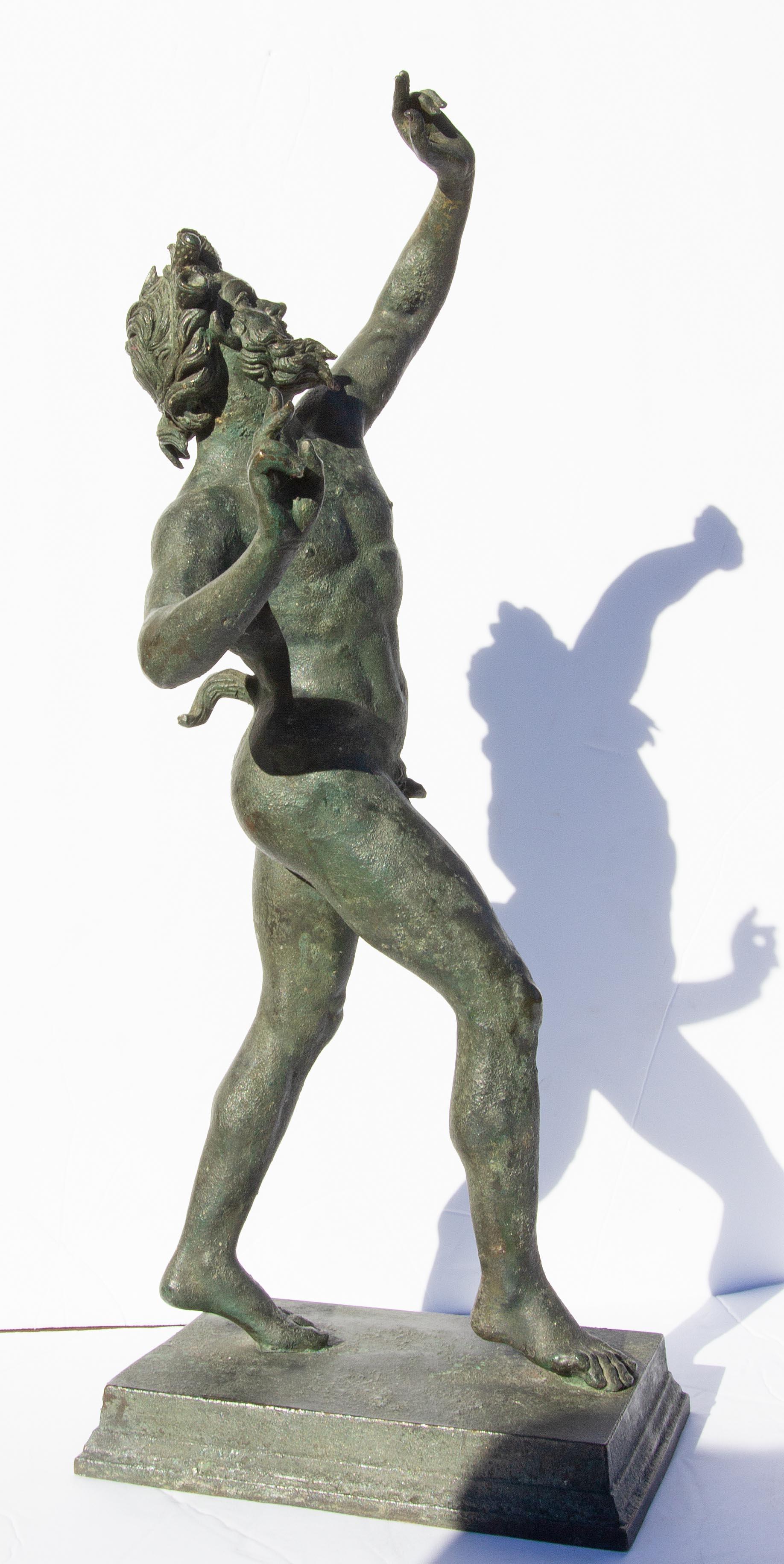 Grand Tour bronze sculpture. Antique early 20th century. Verdigris patina. “The Dancing Faun” of the House of Faun in Pompeii. The House of Faun was the largest and most expensive residence in ancient Pompeii, and today it is the most visited of all