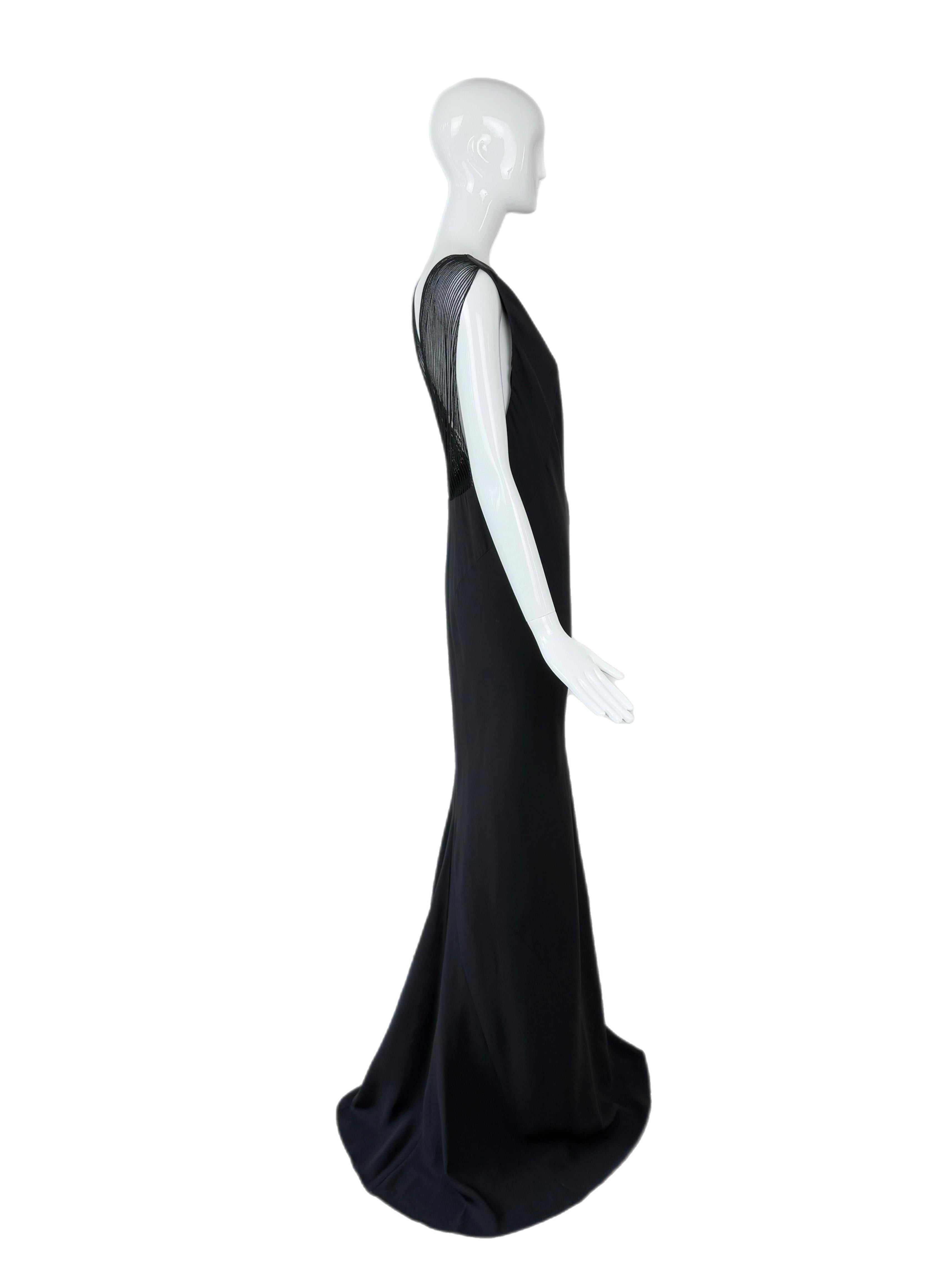 Los daneses
Vintage
Negro
100% seda
Extra larga
Jersey
Espalda de malla transparente
Talla USA 8
NWT's, Prístino
Medidas en centímetros en horizontal: largo 66, de fosa a fosa de 16 a 18, el más pequeño de cintura hasta 17
La etiqueta de cuero
