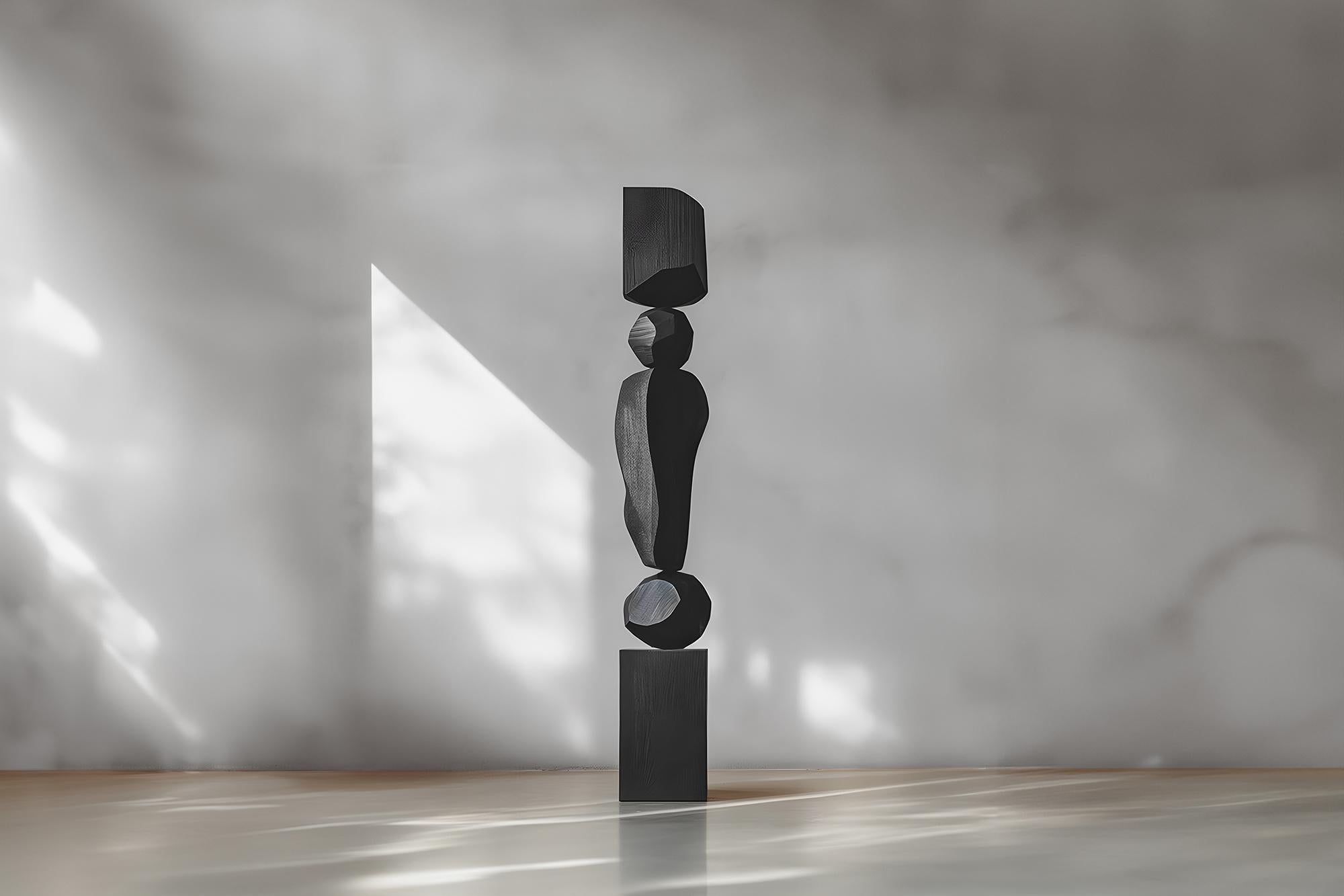 The Dark Elegance of Abstract Black Solid Wood Captured by Escalona, Still Stand No102

——

Joel Escalona's wooden standing sculptures are objects of raw beauty and serene grace. Each one is a testament to the power of the material, with smooth