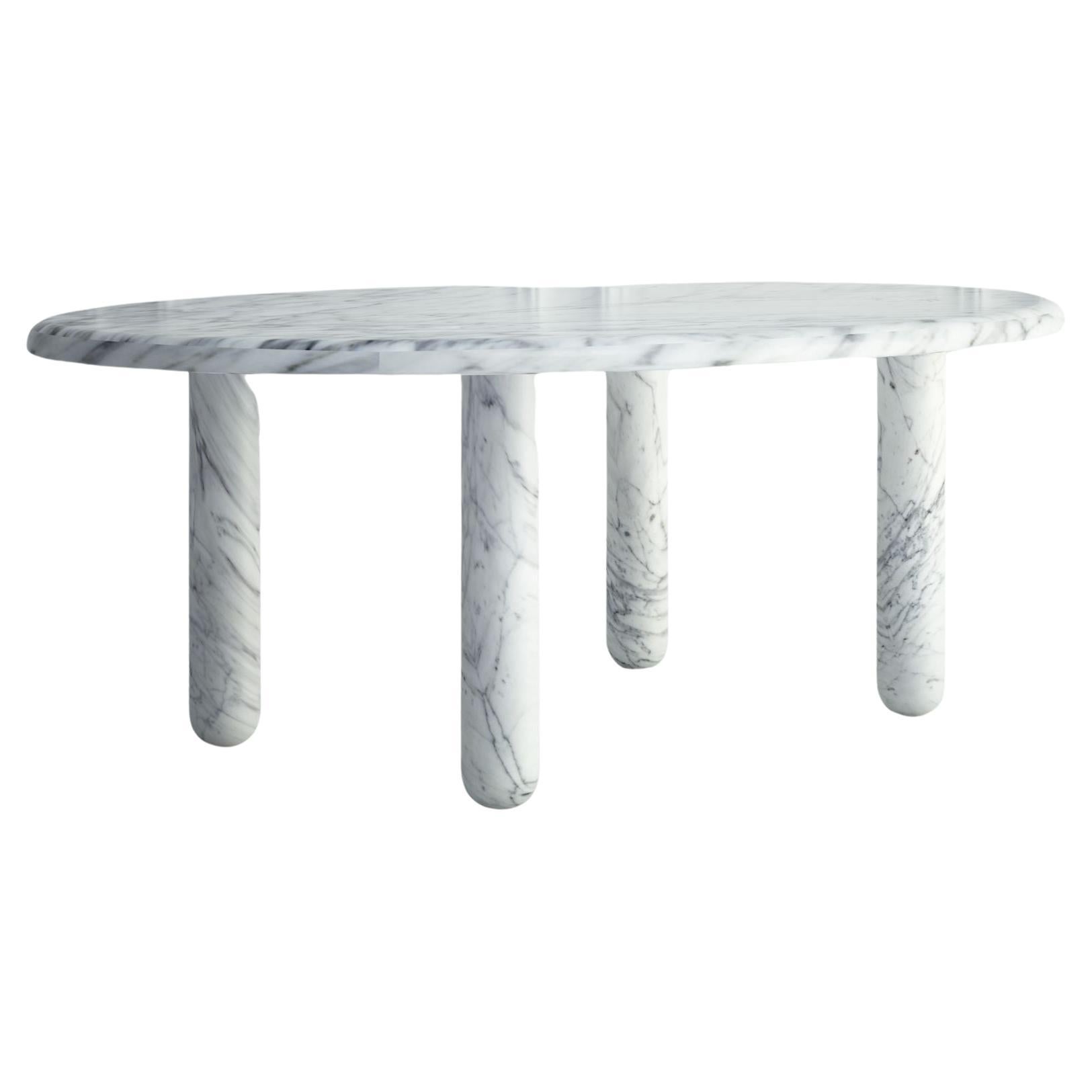 Le Delphine : une table de salle à manger moderne en pierre avec un plateau ovale et 4 pieds arrondis