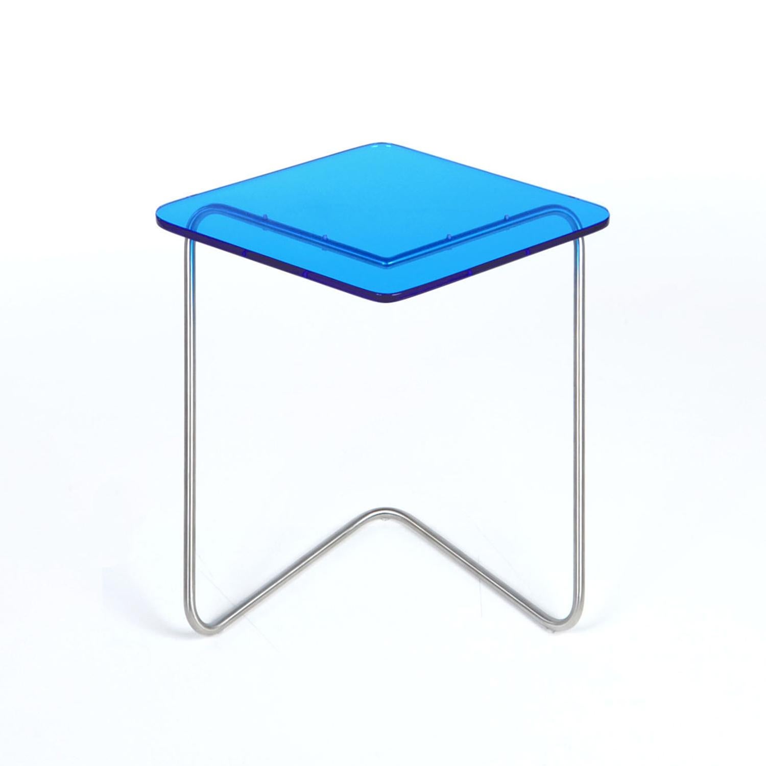 The Diamond side table by Rita Kettaneh 
Dimensions: The base: brushed stainless steel 
 optionally plated with copper or brass
 The top: acrylic
Materials: H 42 x W 45 x D 34.5 cm
Weight: 2.65 Kg

Colors and Finishes: 
Stainless finish: