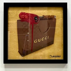 Peinture d'art de Stencil Street de l'artiste britannique Dotmasters : rouleau haut Gucci 24 carats