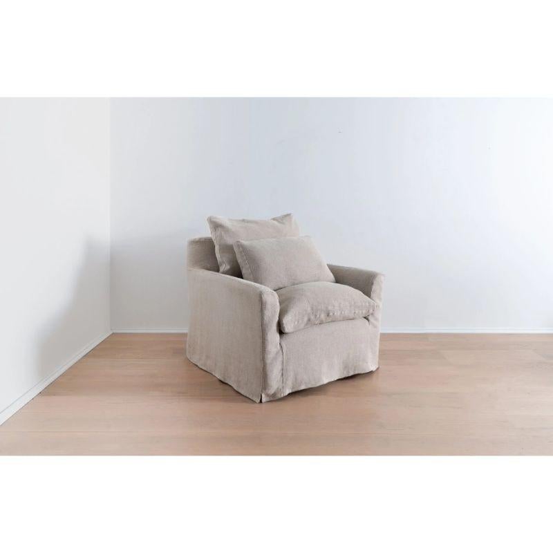 The Cisco Brothers slipcovered Donato Chair in Brevard Burlap linen combines comfort, quality craftsmanship, and durable, eco-friendly manufacturing to result in a stylish organic modern lounge chair for your living room. 

Cisco is considered one