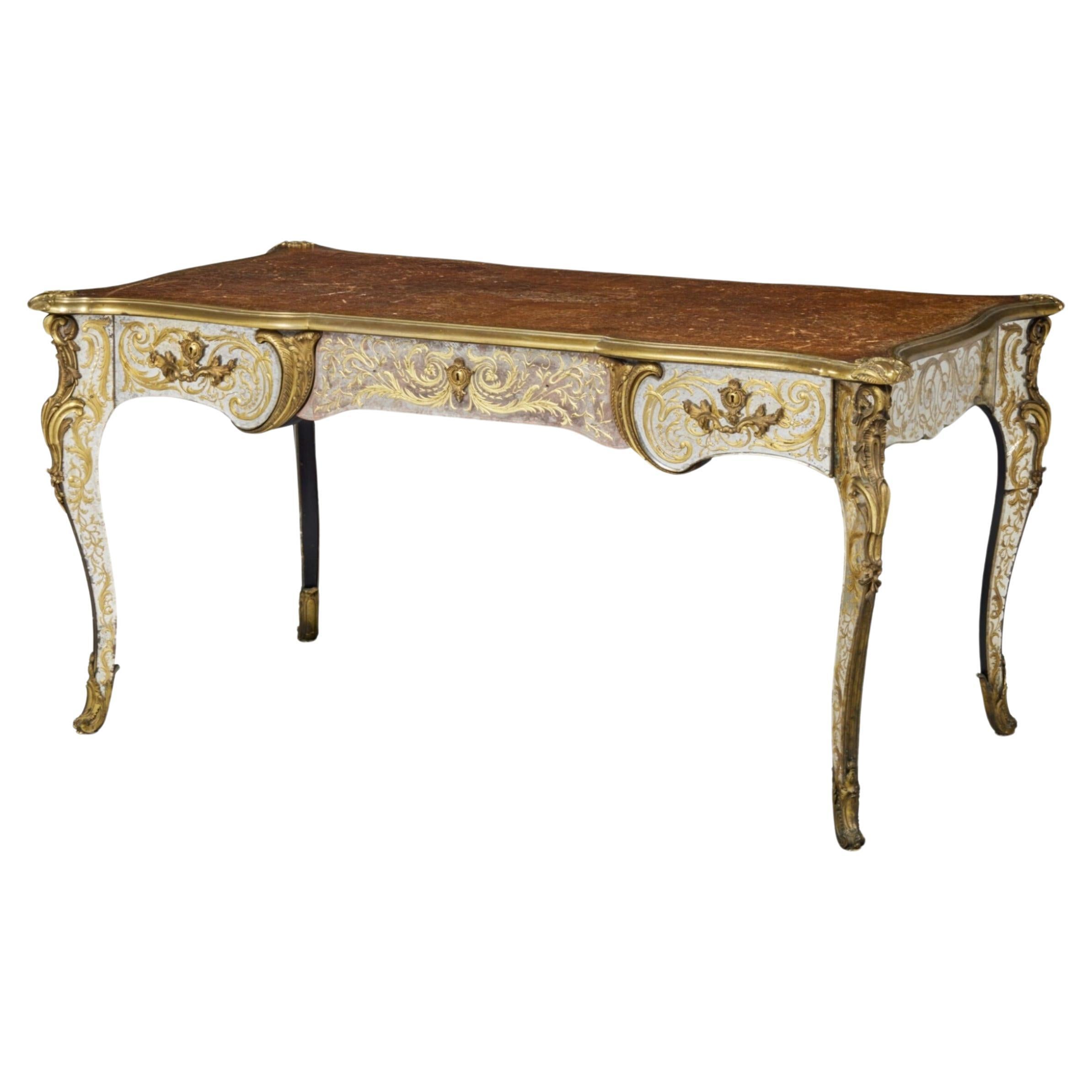 A Timeless Masterpiece: 

The Exquisite Bureau Plat of The Duke and Duchess of Windsor

In the world of fine art and antiques, certain pieces transcend time, becoming symbols of opulence and refined taste. One such masterpiece is the Louis XV Style