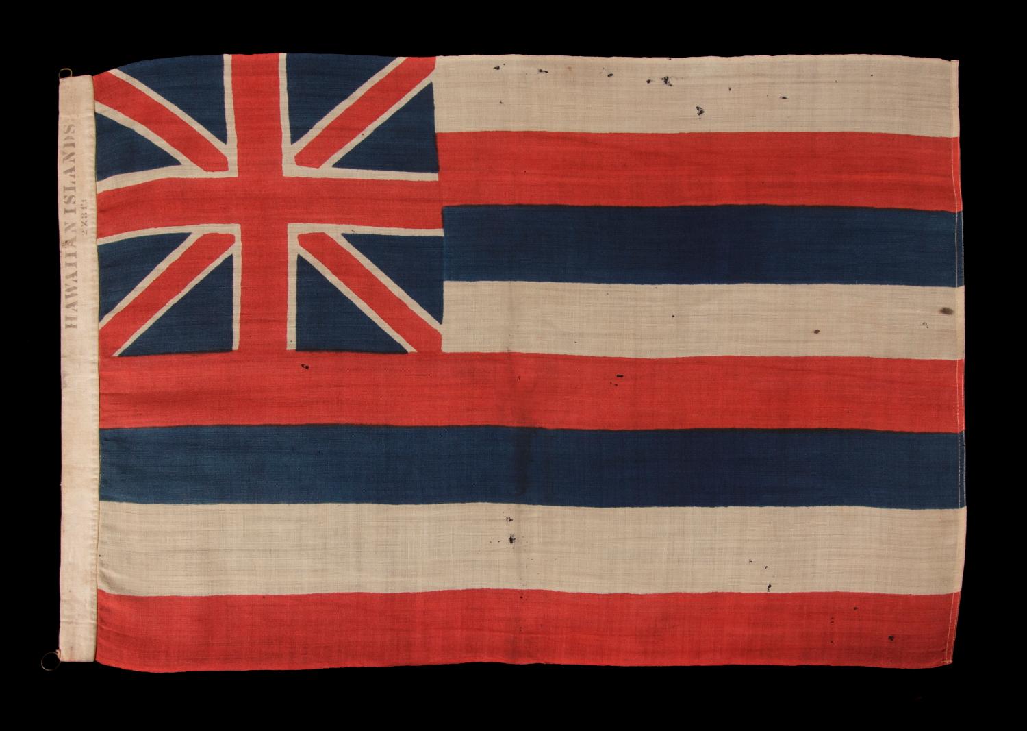 THE EARLIEST FLAG OF THE HAWAIIAN ISLANDS THAT I HAVE EVER ENCOUNTERED, MADE DURING THE MONARCHY, WITHIN THE PERIOD OF BRITISH PROTECTORATE, PRODUCED BY HORSTMANN & BROTHERS COMPANY IN PHILADELPHIA FOR DISPLAY AT THE 1876 CENTENNIAL INTERNATIONAL